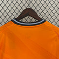 24-25 Real Madrid away orange soccer jersey