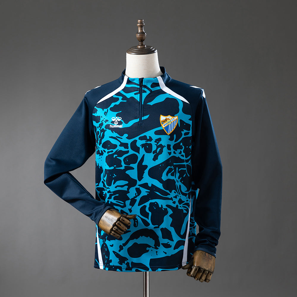 Malaga 25/26 Training Top Blue S-XXL