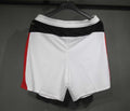 MILAN Pantalon corto Version autentica/jugador — Serie A