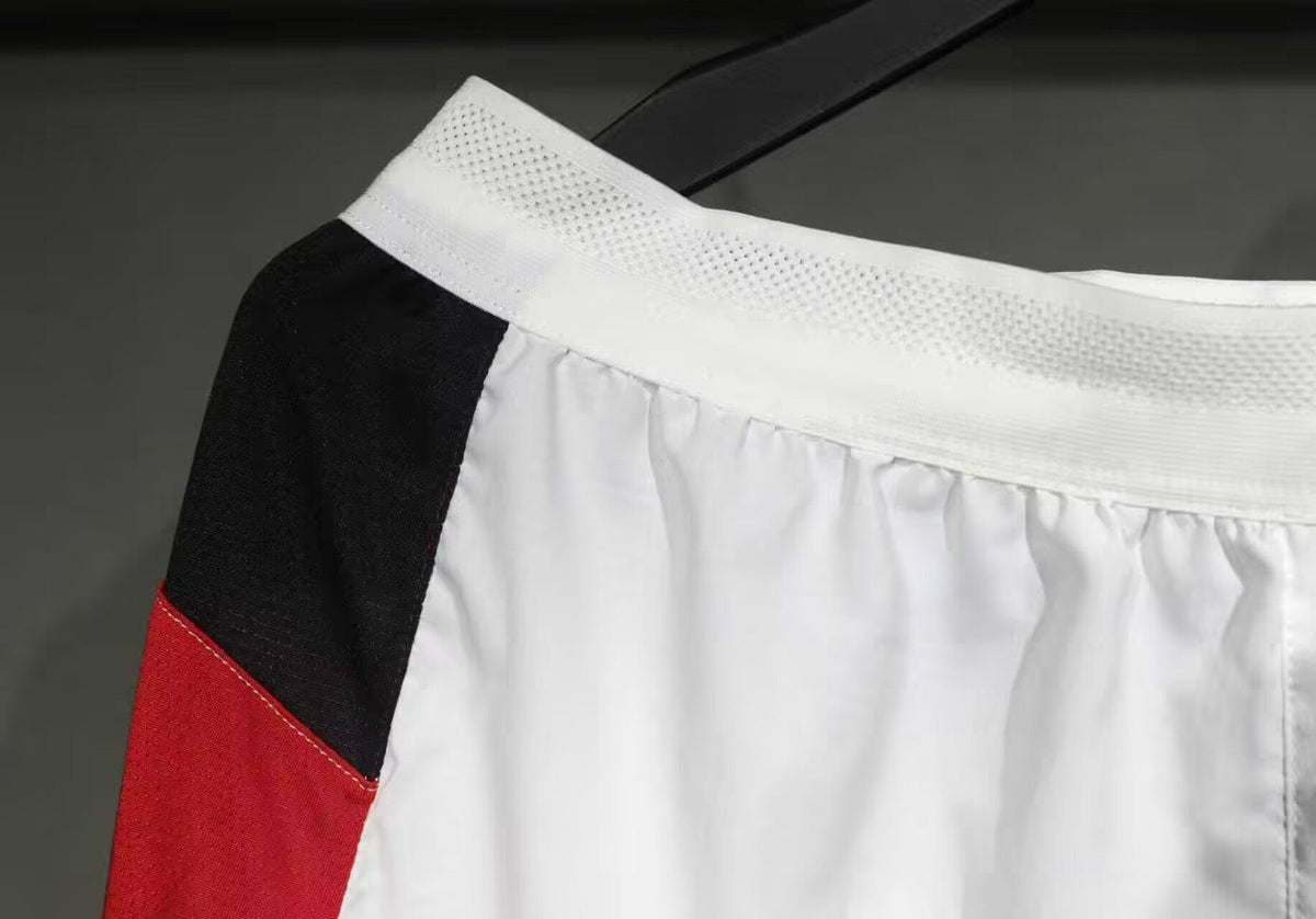 MILAN Pantalon corto Version autentica/jugador — Serie A