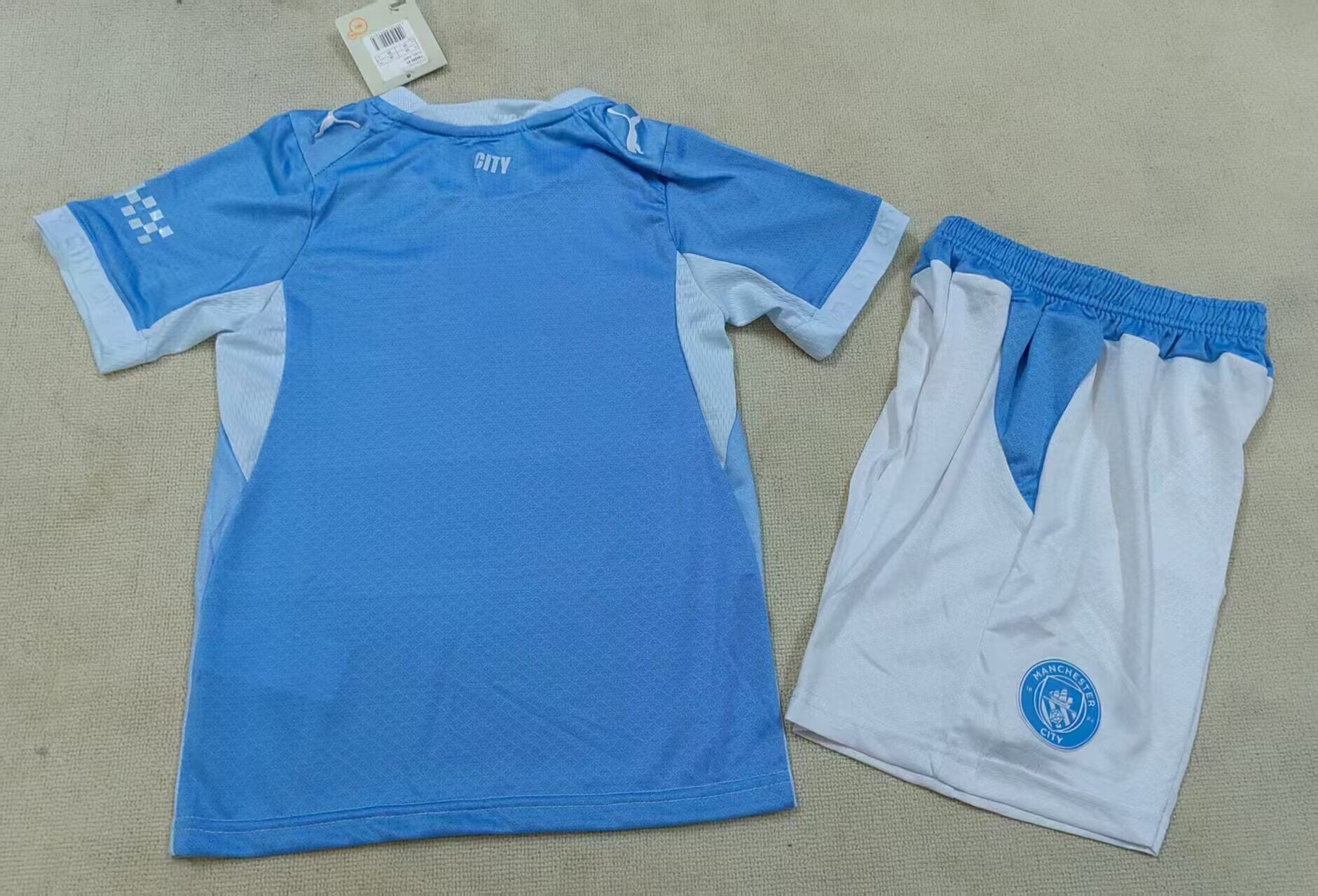 MAN CITY Kit infantil Version jugador — 26-27 Fake