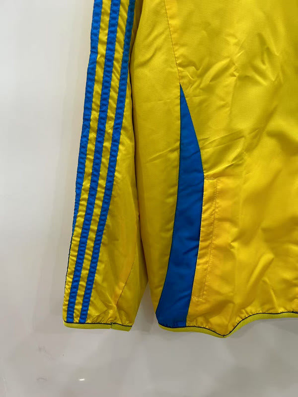 25-26 ASN blue yellow reversible Windbreaker