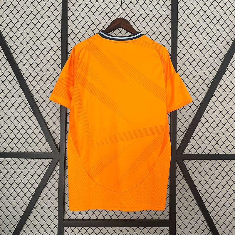 24-25 Real Madrid away orange soccer jersey